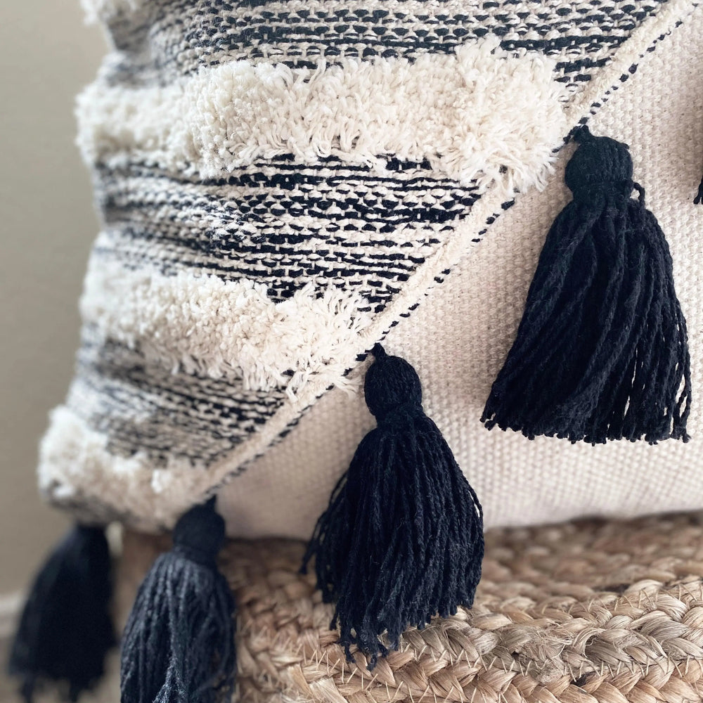 Chloe Throw Pillow, Calla Collective, black throw pillow, white throw pillow, colorblock pillow, textured pillow, neutral home decor, pillow with tassels, tassels, fringe, contrast, contrasting pillow, black and white home decor, decorative pillows, pillow cover, insert, accent pillow